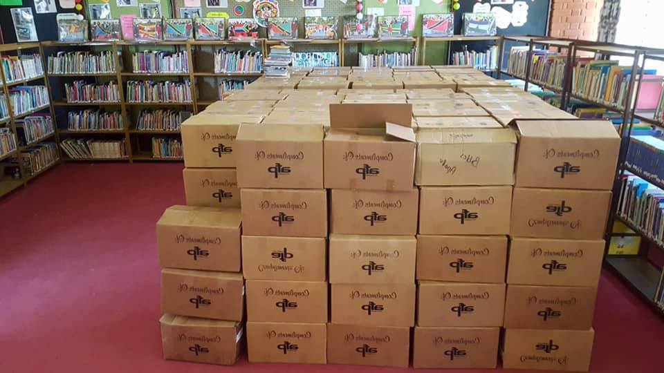Books stacked in library